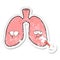 distressed sticker of a cartoon unhealthy lungs