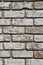 Distressed Stone Brick Background on a Property in Richmond, Texas, with whitewashed paint fading on the Brick facings.