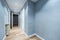 Distributor hallway with blue painted walls