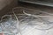 Disused discarded ruined abandoned LAN cable wires roll circle rope on the floor renovation decoration refurbish garbage trash