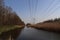 Ditches with water and electricity wires at Park Hitland between Capelle an d Nieuwerkerk aan den IJssel