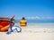 Dive equipment on white sand beach