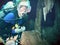 A Diver Glides Past a Stalactite in a Fresh Water Cenote