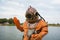 Diver immerses in a vintage deep sea diving suit