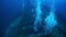 Diver inside shipwreck in underwater world of Truk Islands.