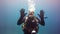 Diver shows OK underwater in Atlantic ocean.