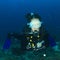 Diver - smiling girl underwater