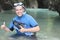 Diver smiling in ocean cavern