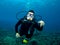 Diver swimming over a Reef in Kona Hawaii