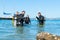 Divers entering water at Pilot Bay wharf for annual beach clean