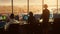 Diverse Air Traffic Control Team Working in a Modern Airport Tower at Sunset. Office Room is Full of