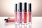 Diverse Array of Sparkling Lip Glosses in Assorted Shades