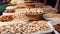 Diverse Assortment of Nuts at a Rustic Market Stall