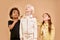 Diverse beautiful children look up isolated in studio