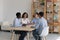 Diverse company staff take part in briefing in the office