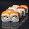 Diverse delicious sushi roll set on a black background with reflection, menu