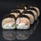 Diverse delicious sushi roll set on a black background with reflection, menu