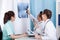 Diverse doctors analyzing patient\'s x-ray