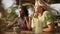 Diverse female friends in outdoor restaurant chatting. Multiracial cheerful girls sitting at the table in a tropical