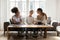 Diverse girls friends laughing chatting take break during study process