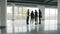 Diverse group of businesspeople standing inside newly constructed industrial building talking