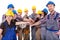 Diverse group of construction workers stacking hands