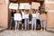 Diverse group of people protesting with blank signs. Protest against human rights, abuse of freedom, social issues