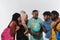 A diverse group of students is gathered around a globe, engrossed in exploration and study, their vibrant energy