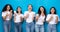 Diverse Ladies Holding Cellphones Gesturing Yes Over Blue Background, Panorama
