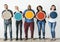 Diverse people holding blank round board