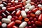 Diverse pills arrayed on red, allowing text Patterns and pill identification featured