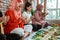 Diverse religion friends eating together at home