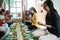 Diverse religion friends eating together at home