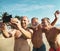 Diverse senior men taking the beach selfie