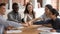 Diverse student stack hands together fists bumping showing unity