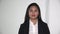 Diverse Unemotional Filipina Business Woman Isolated