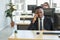 Diversity Business and Work palce concept. African businessman talking on call with mobile smartphone in office with desktop