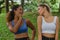 Diversity of caucasian and african american woman friends in sportswear having workout in park