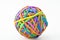 Diversity and complexity conceptual idea with multicoloured rubber band ball made of mixed coloured strip bands isolated on white