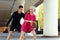 Diversity man and woman playing basketball, posing for camera on city basketball court, lifestyle active leisure young