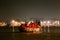 Diversity of people in the boat floating on the river are going to pray at Varanasi Ganga Aarti at holy Dasaswamedh Ghat.
