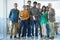 Diversity is this teams strength. Portrait of a diverse group of colleagues standing together in an office.