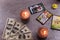 Divination cards alignment with money and green candles. Mystery, astrology, fortune telling, belief and wealth