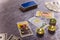 Divination cards alignment with money and green candles. Mystery, astrology, fortune telling, belief and wealth