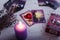 Divination cards alignment with purple burning candle and dry lavender. Mystery, astrology, fortune telling and belief