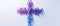 Divine Mosaic: A Christian Cross of Miniature Purple and Blue Crosses on a White Canvas -
