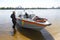 Diving boat floating on the Dnieper river with police lifeguards on duty and equipment aboard