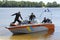 Diving boat floating on the Dnieper river with police lifeguards on duty and equipment aboard