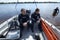 Diving boat floating on the Dnieper river with police lifeguards on duty and equipment aboard