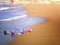 Diving mask and snorkel on a sand beach left on water edge